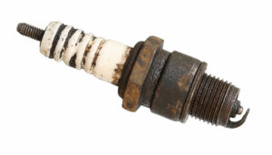 Can spark plugs cause rough idle