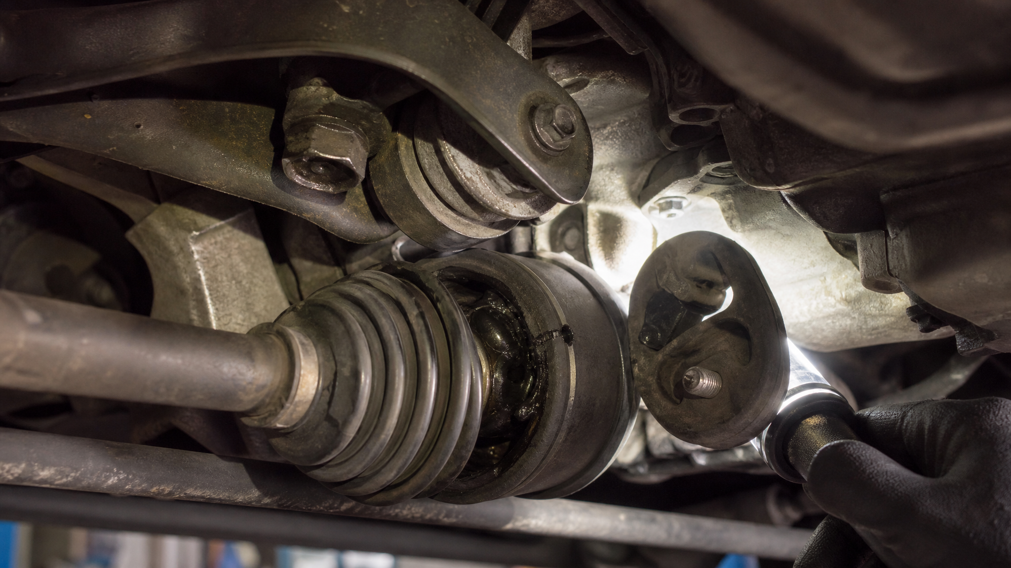 Checking CV joint engine mount and exhaust for knocking