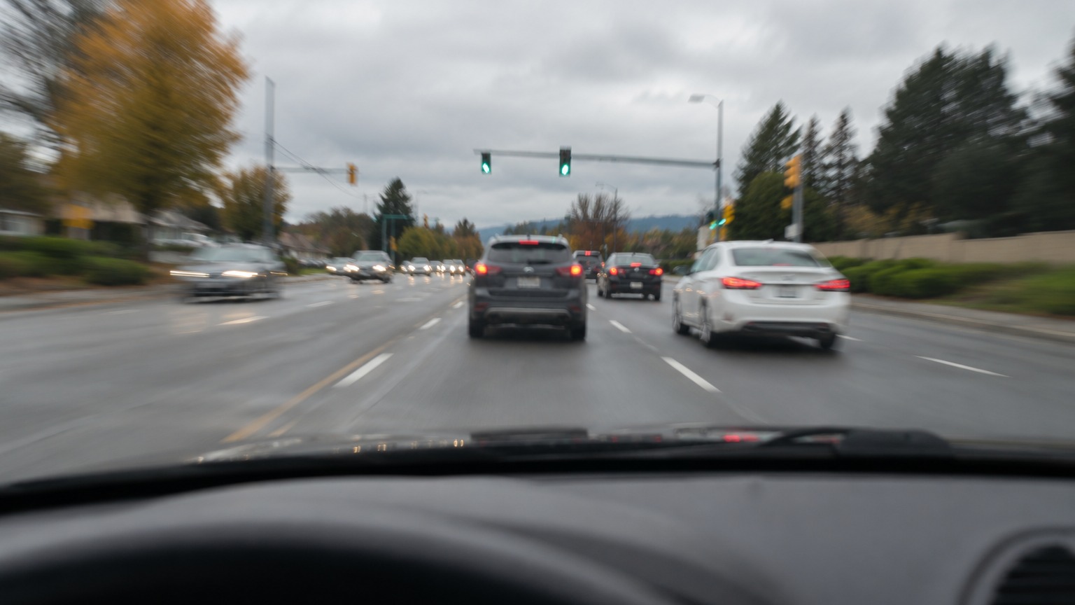 Road view illustrating hesitation at a stoplight